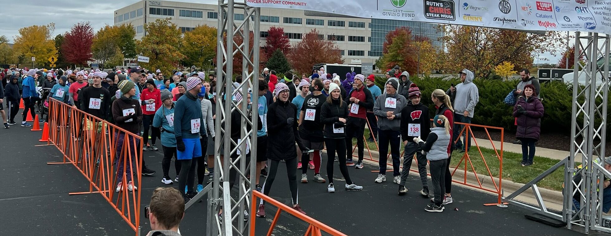 Gilda's Club's Run/Walk image of a group of runners ready to begin a race.