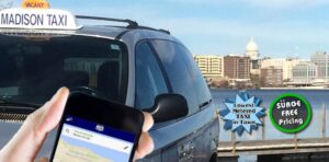 a person holding a cell phone in front of a van