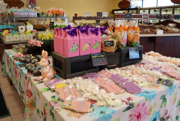 a table topped with lots of bags of candy.